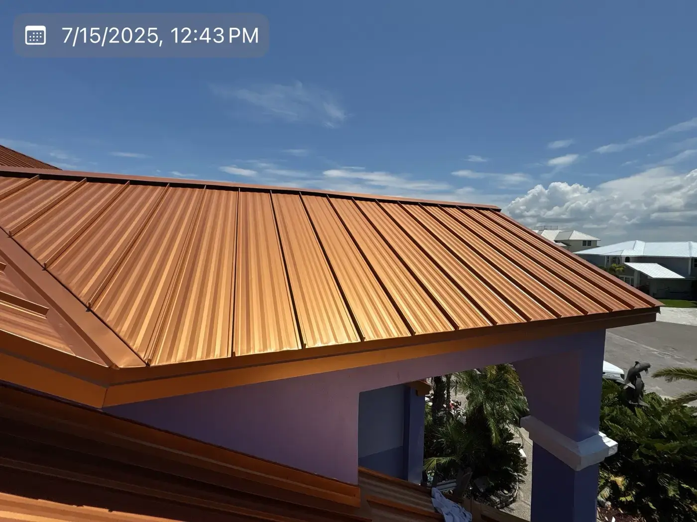 Standing-seam copper roof installed by RoofX on a coastal Florida home